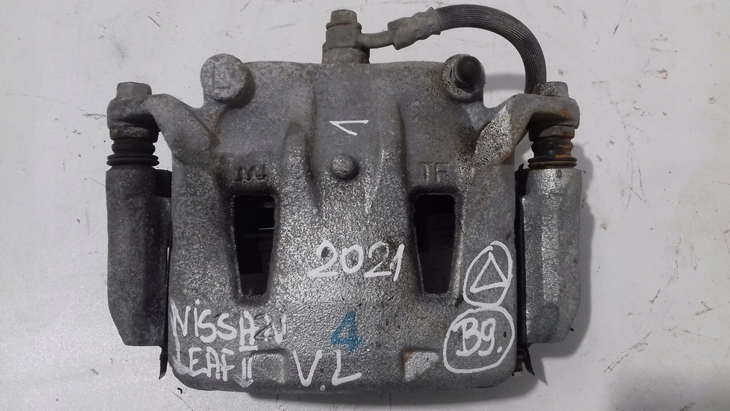 фото №1, Nissan leaf ii суппорт тормозной левый перед