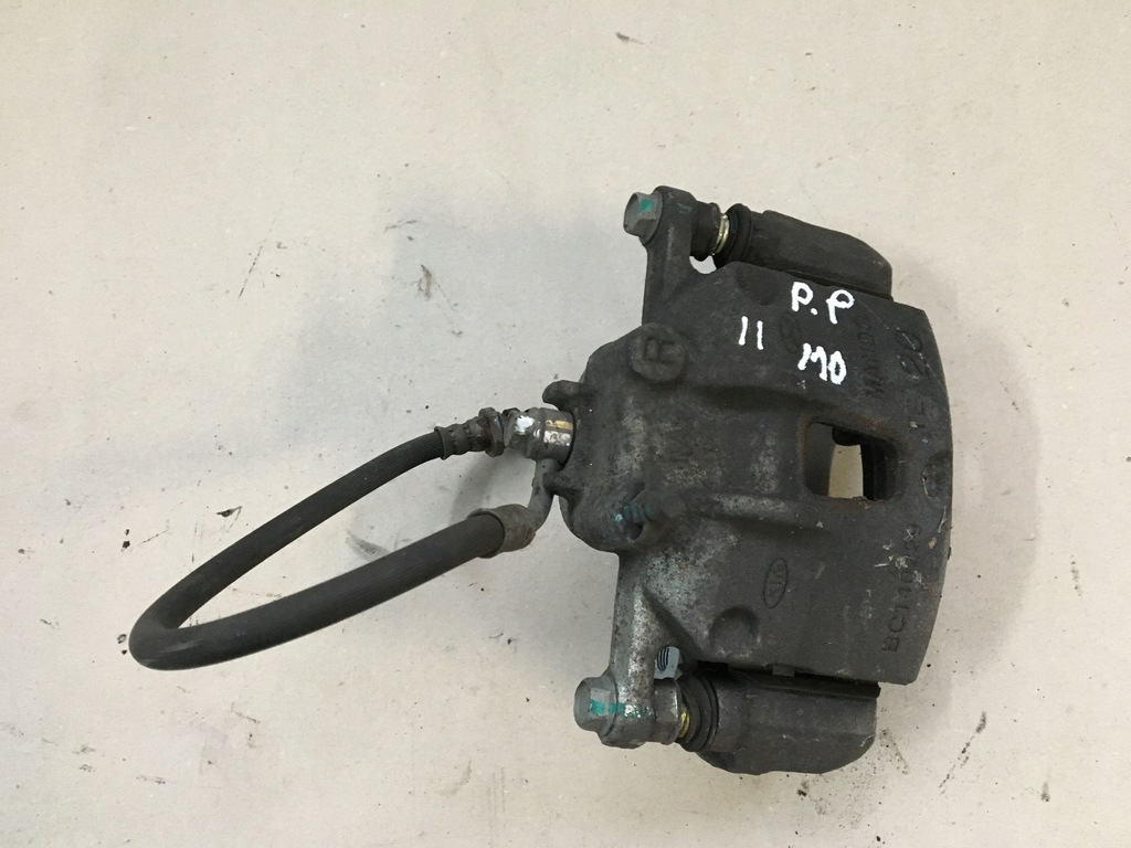 фото №1, Hyundai i10 ii 13- суппорт тормозной правый перед