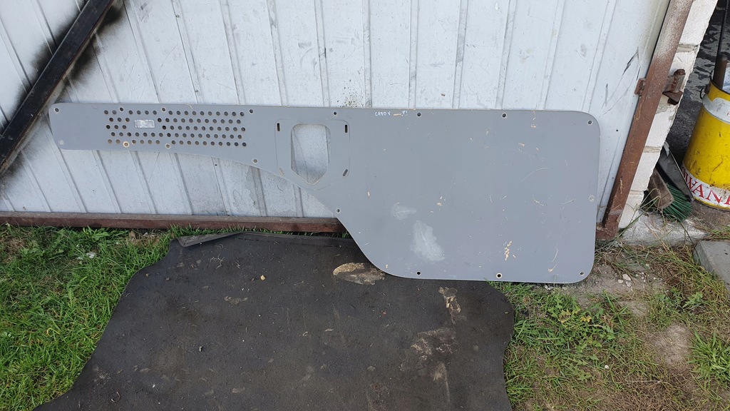 фото №1, Vw caddy iii 03-10 - захист обшивка багажника ліва фанера