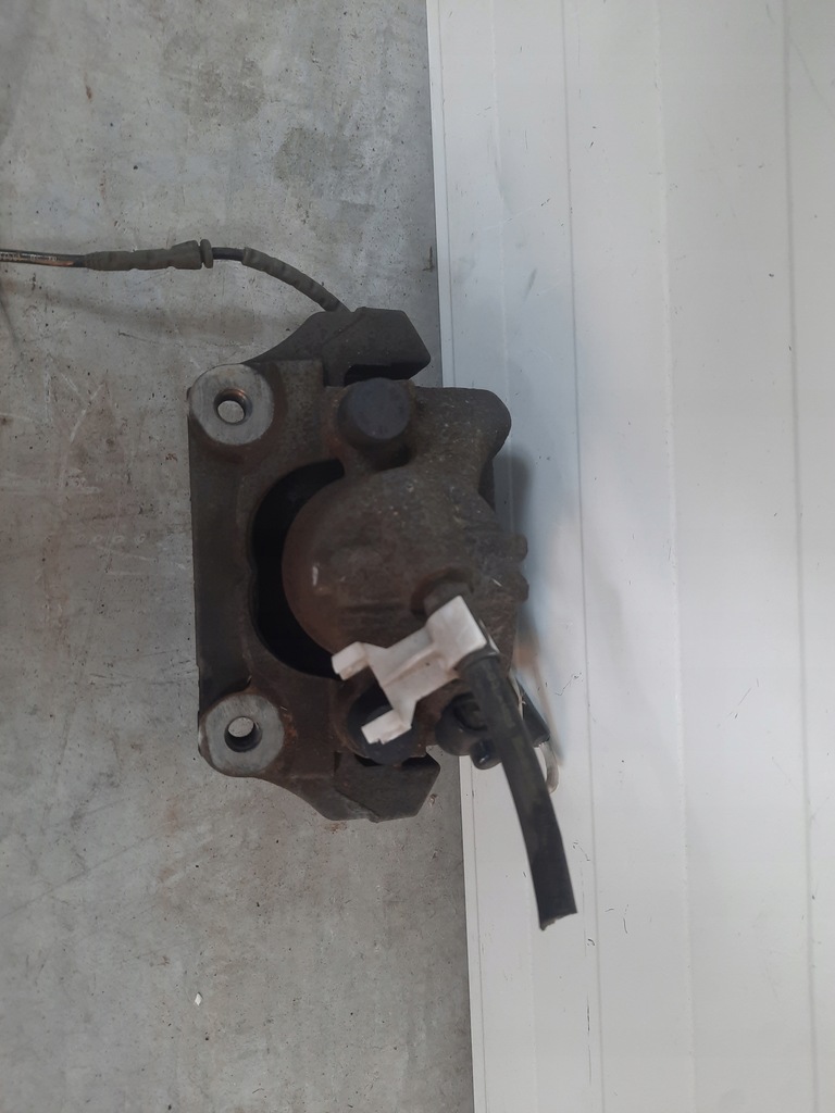 фото №7, Супорт гальмівний лівий перед bmw x1 e84