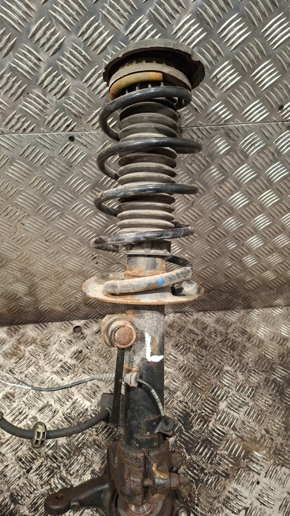 Амортизатор поворотный кулак левый перед peugeot 301 1.6hdi Цена