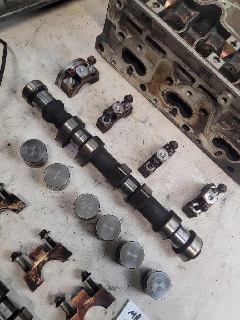 Головка + валы распределительного вала оригинальный номер 90412232 opel omega b 2.5b Цена