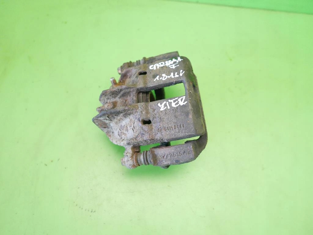 фото №1, Супорт гальмівний лівий перед mitsubishi carisma i