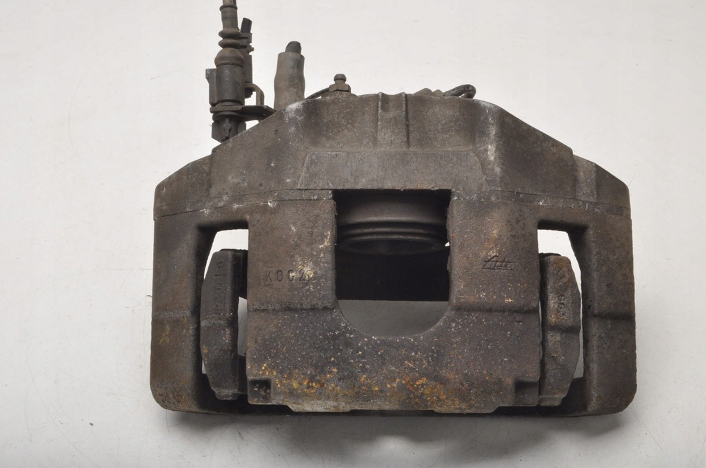 фото №1, Audi a6 c6 супорт гальмівний лівий перед 982