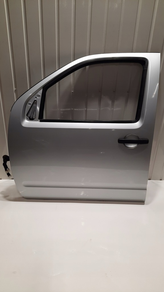 фото №1, Nissan navara d40 kl0 дверь левая передние перед