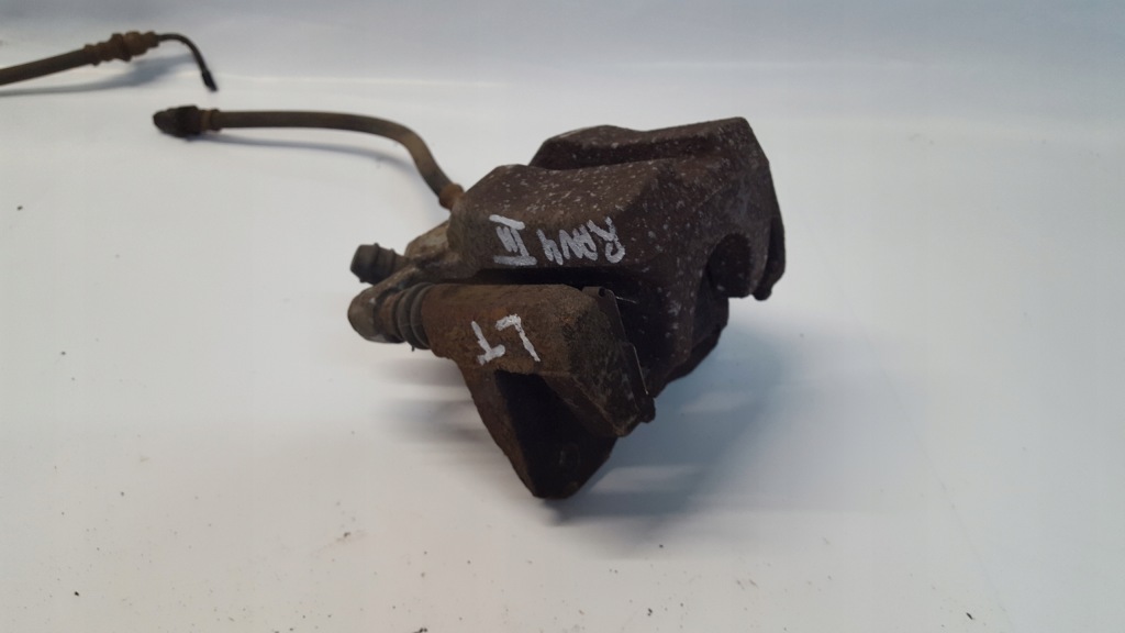 фото №1, Rav4 iii супорт гальмівний лівий задня 2,2 d4d