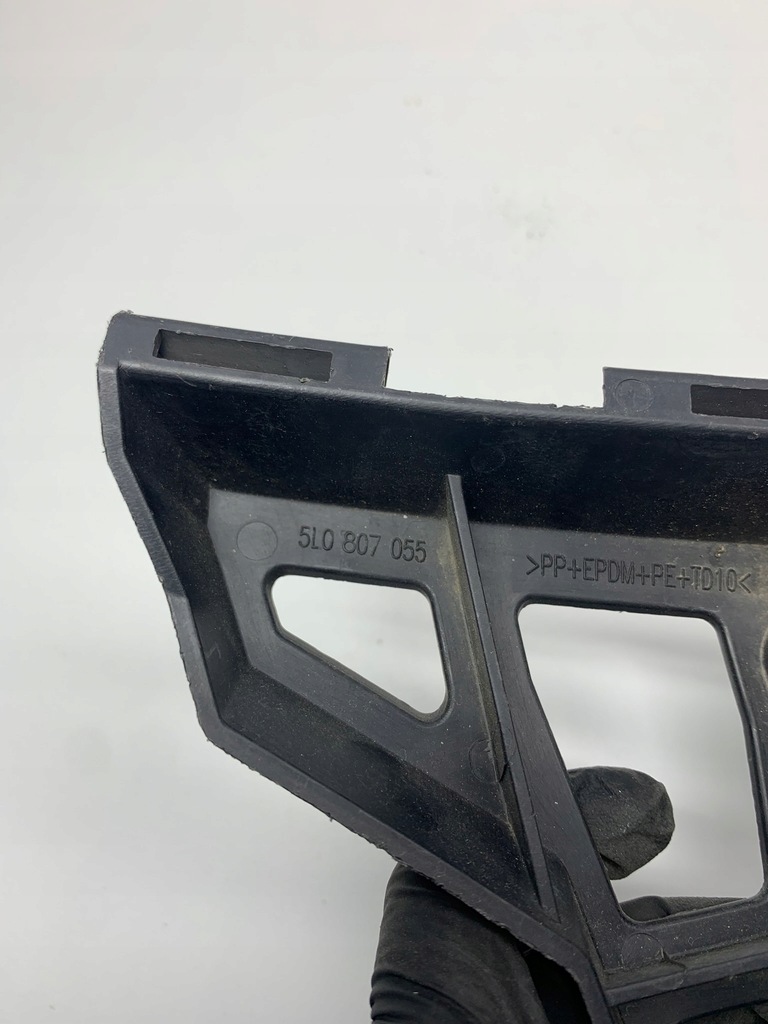 фото №7, Skoda yeti направляющая кронштейн распылителя бампера левый перед 5l0807055