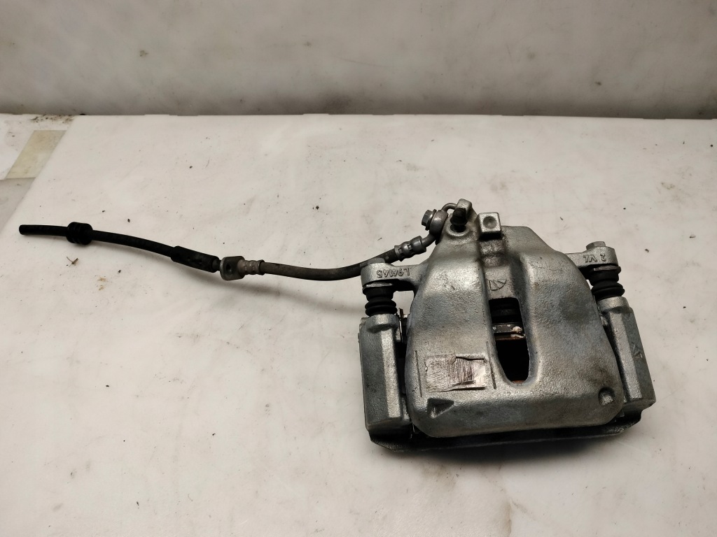 фото №1, Суппорт тормозной правый перед corsa f 9824176680