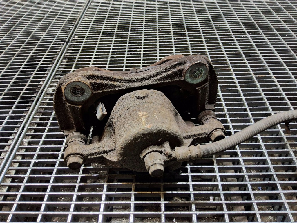 Супорт гальмівний передній перед сторона ліва ssangyong tivoli bc140257 Недорого