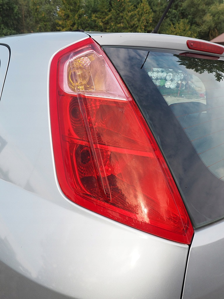 фото №2, Grande punto лампа ліва задня задня