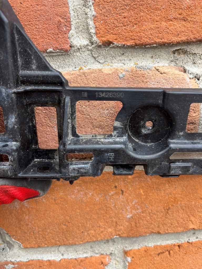 фото №11, Opel оригинальный номер 13426390 направляющая бампера