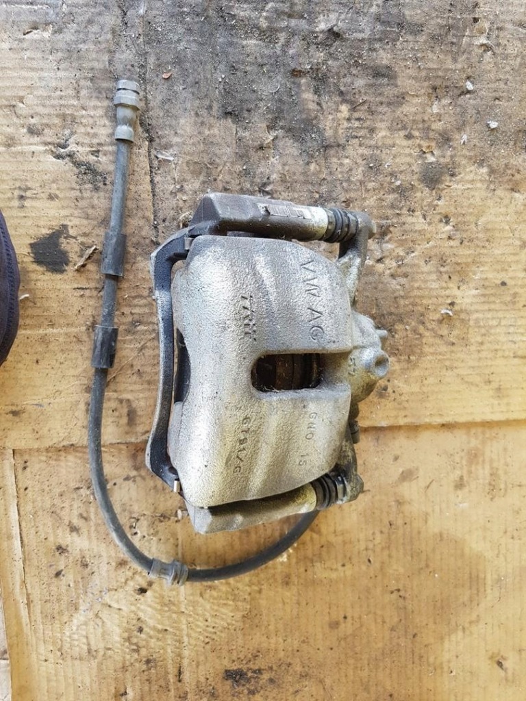 фото №1, Супорт гальмівний лівий перед vw golf vii 5521c