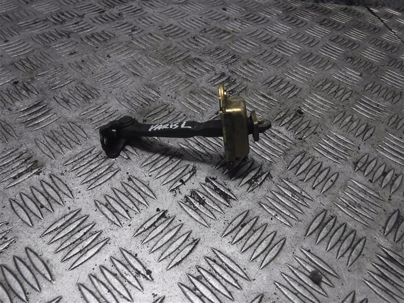 фото №1, Обмежувач двері лівий перед toyota yaris i