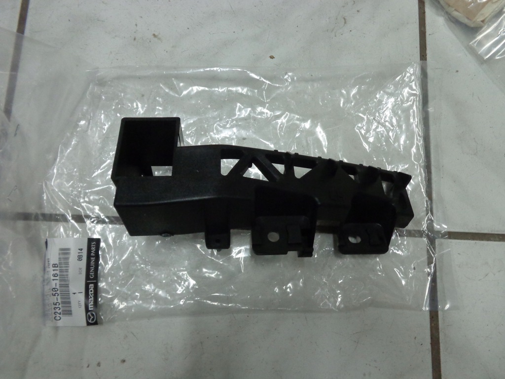 фото №1, Mazda 5 2005-2008 напрямна лівий pod фара новий oryg.