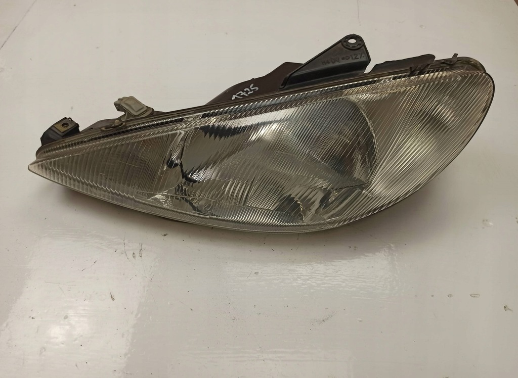 фото №1, Лампа левая передняя peugeot 206