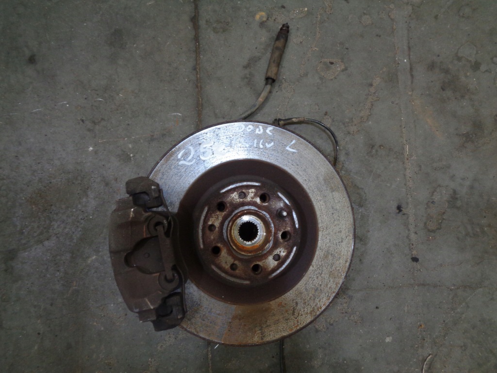 фото №1, Поворотный кулак ступица fiat doblo 2 ii opel combo d 1.4 16v 2010- левая передняя