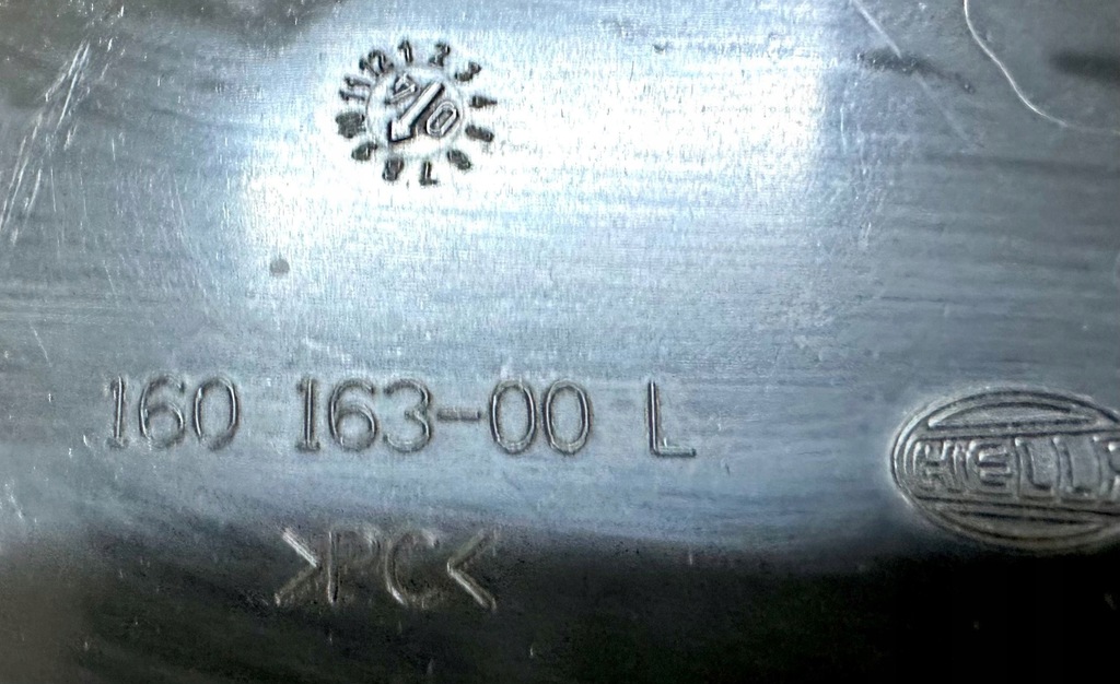 фото №9, Audi a6 c6 заглушка кришка лампи лівий перед оригінальний 16016300