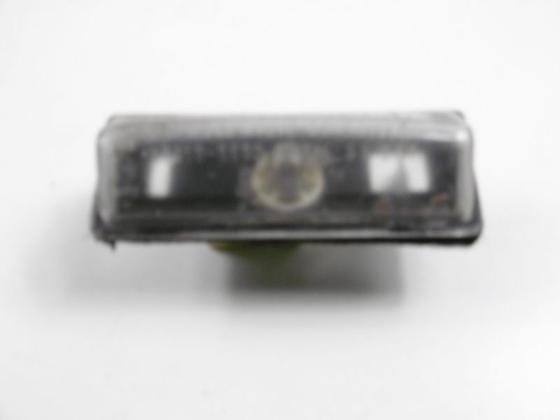 фото №11, Liana 01-04 лампа освещение номерного знака sedan 4d