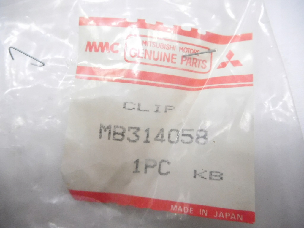 фото №6, Супорт, омивач фара mitsubishi colt lancer оригінальний номер mb314058