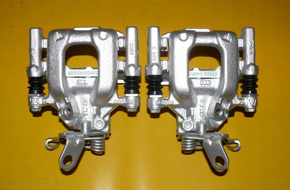 фото №9, Супорти лівий правий задня vw touran i 272/10 03-11r