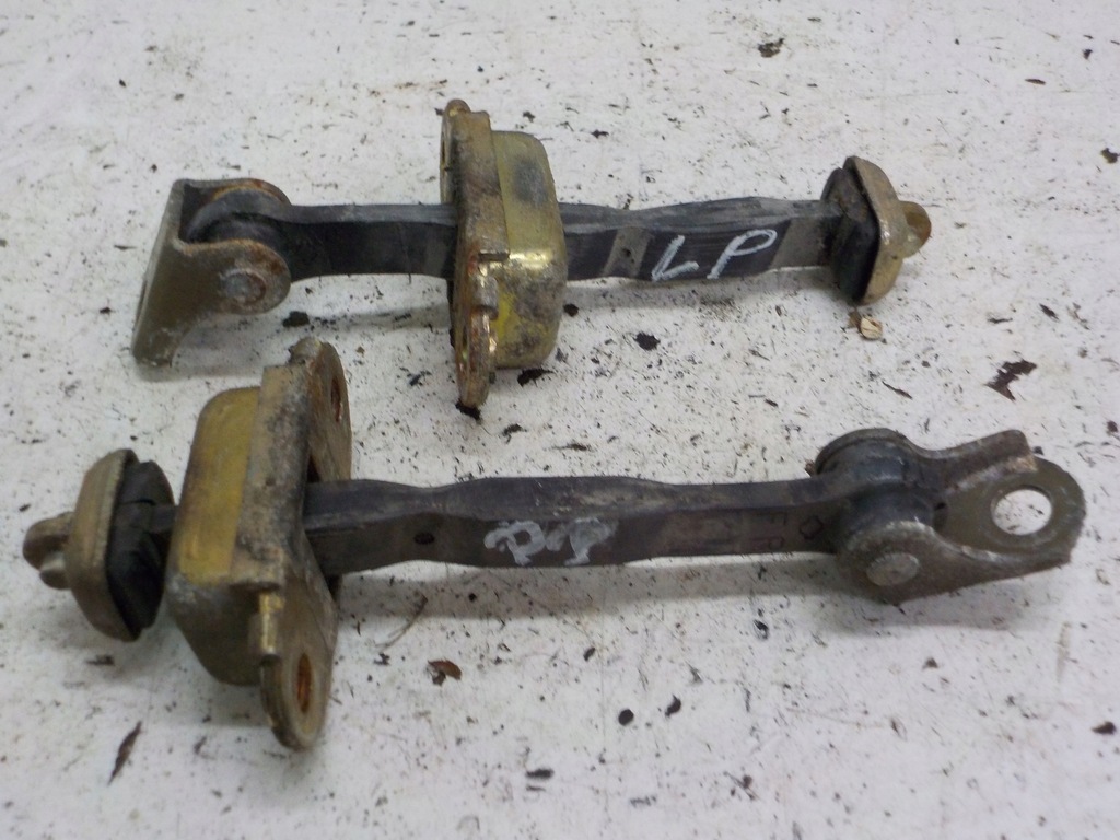 фото №1, Almera tino ограничитель левый перед