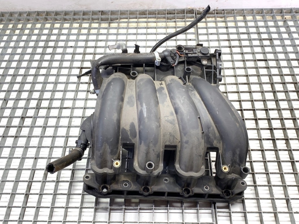 Купити Колектор впускний  bmw e90 2.0 129km 04-12