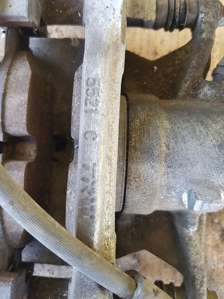 фото №5, Супорт гальмівний лівий перед vw golf vii 5521c