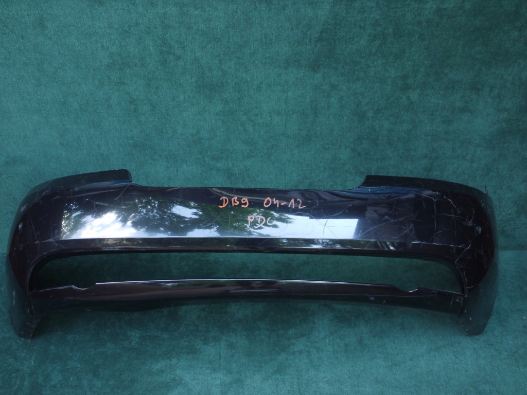 фото №1, Бампер задній заклепки aston martin db9 2004-2010r