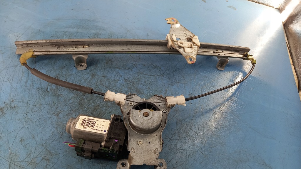 фото №1, Підйомник лівий перед nissan note 1.4b 06r