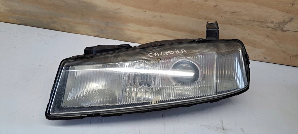 фото №1, Лампа перед левая opel calibra линза eu