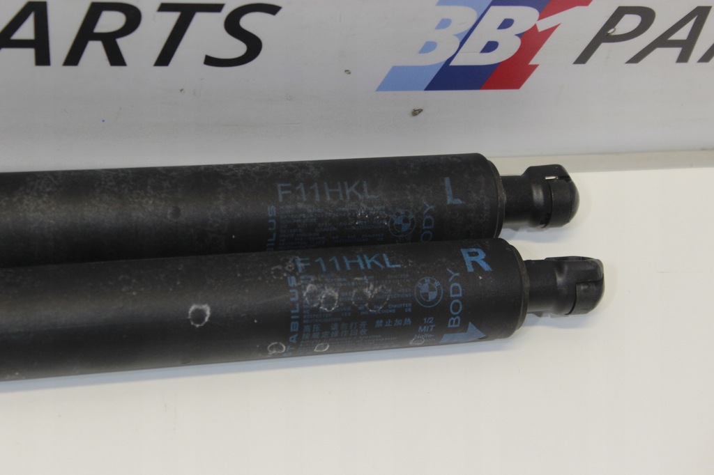 фото №5, Bmw оригинальный номер 7210557 привод крышки стекло