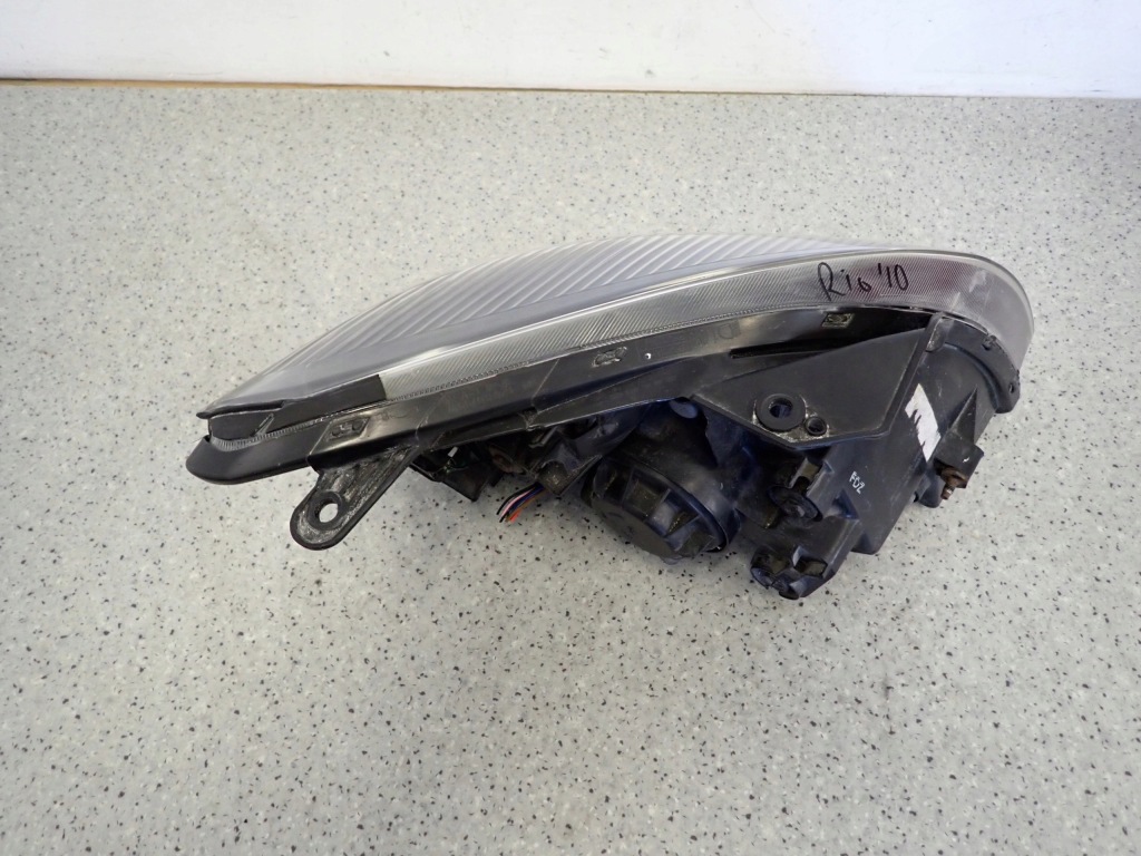 Kia rio ii 10-12 фара лівий лампа передня ліва Оригінал