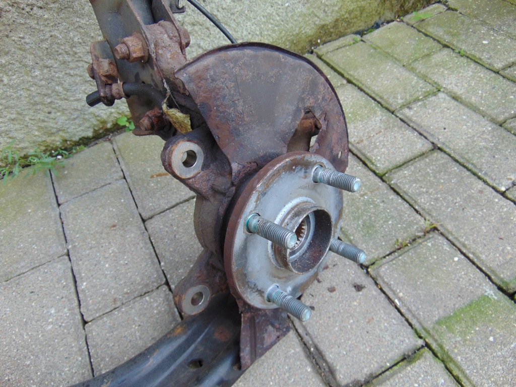 фото №12, Поворотный кулак mcperson левый левая перед mazda 2 de dh demio iii2007r- 1.3b eu