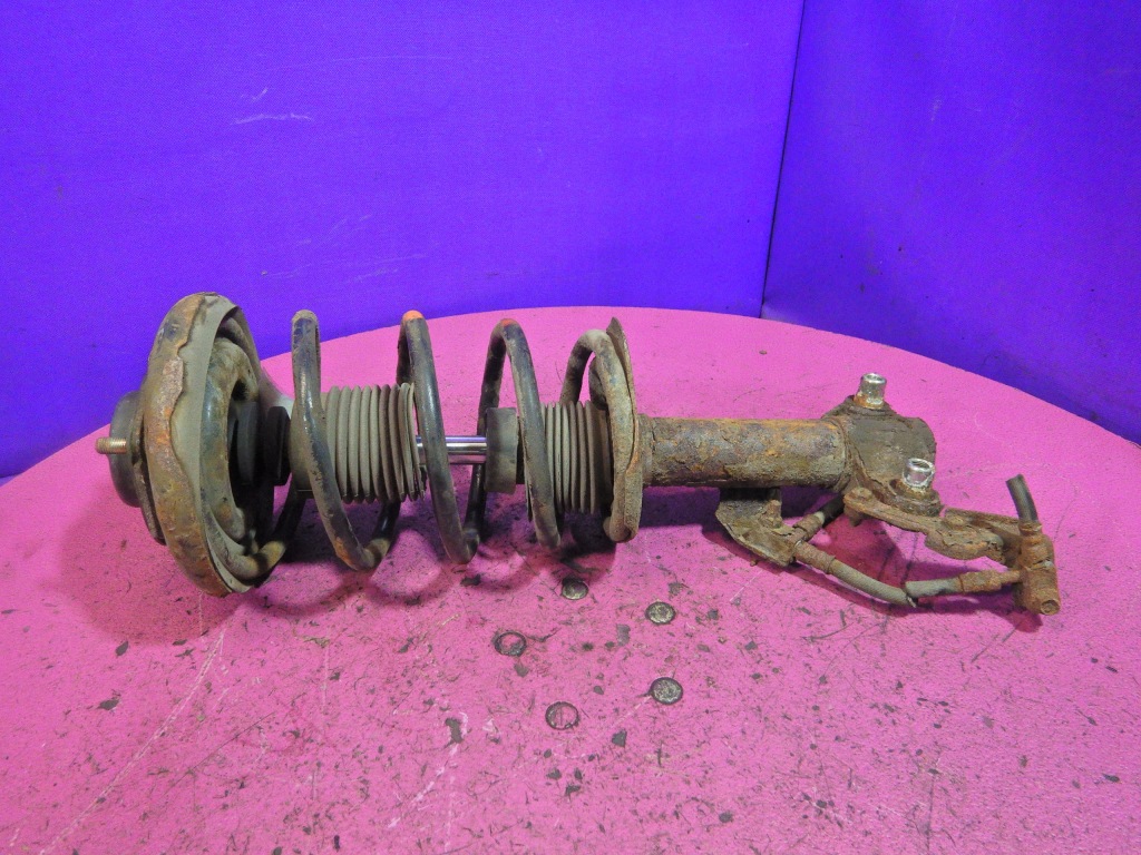 фото №1, Primera p12 1,8 амортизатор mcperson перед левый