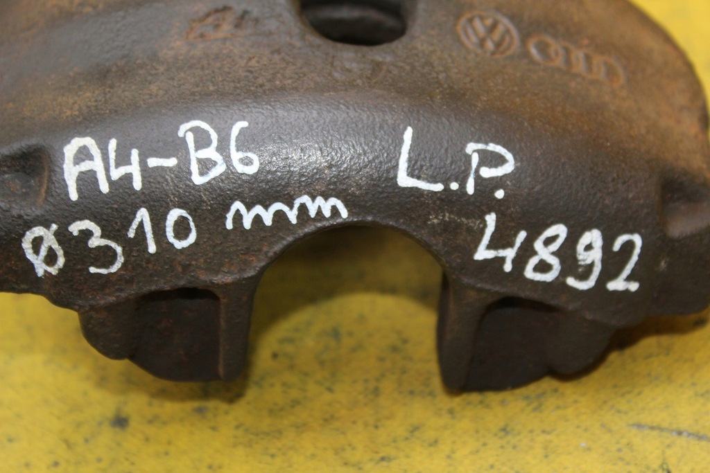 фото №9, Суппорт тормозной левый перед a4 b6 310mm
