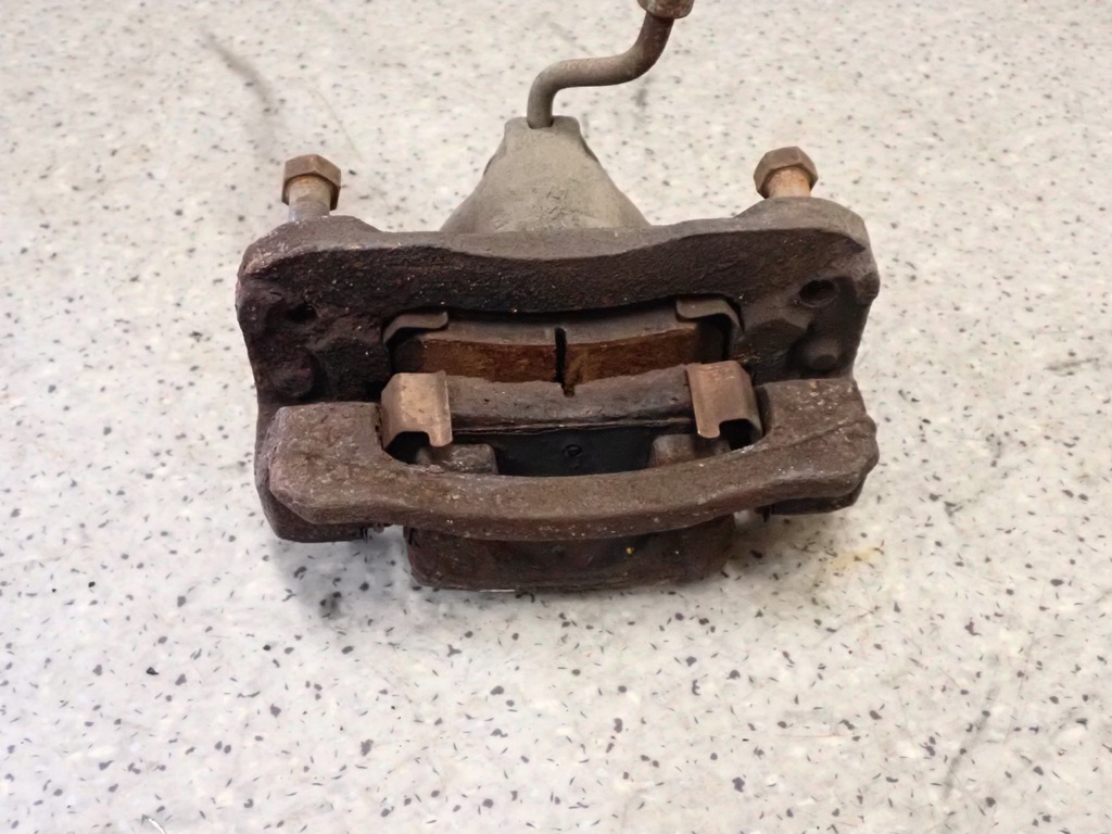 фото №4, Hyundai i20 08-12 суппорт тормозной задний левый