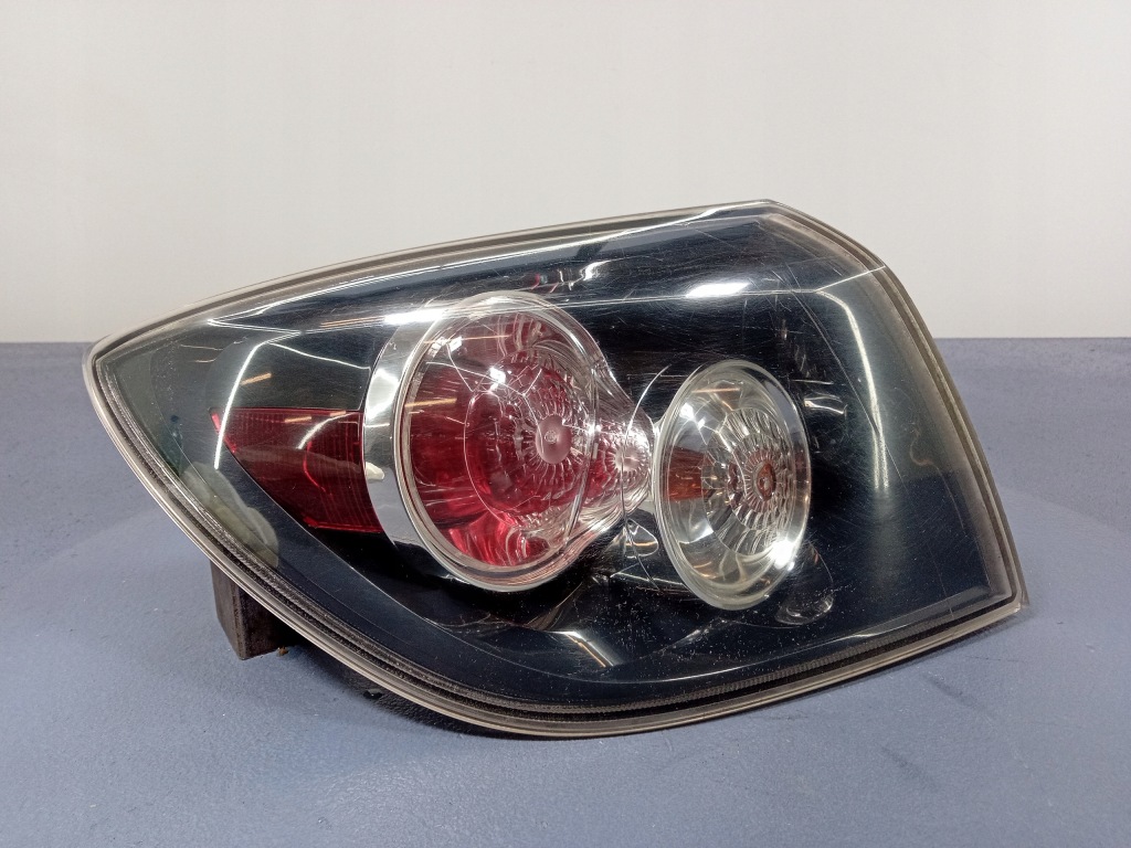 фото №2, Mazda 3 i bk hb лампа задня ліва зовнішня p6312