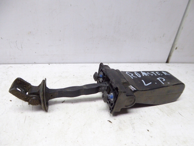 фото №1, Roomster 5j lift 10-15 ограничитель дверь перед левый 5d