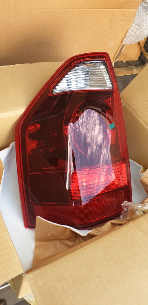 фото №1, Nowa оригінальна лампа задня mitsubishi pajero ліва