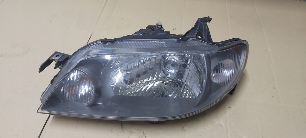 фото №1, Фара лампа левый левая перед передняя mazda 323f 03r