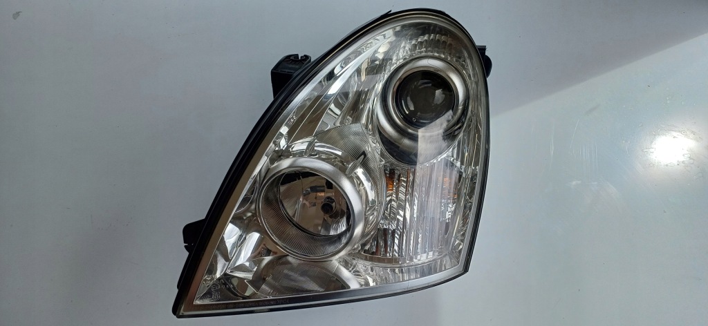 фото №1, Лампа ліва ssangyong rexton lift 06-12
