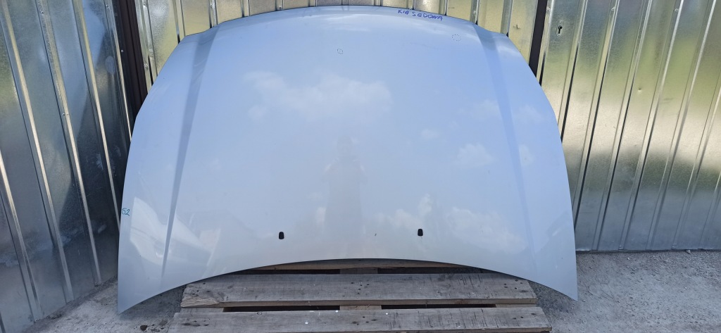 фото №1, Капот kia sedona ii lift 09-12 оригинальный лак