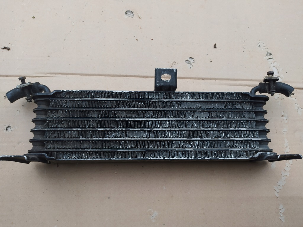 фото №1, L200 2,5td радиатор масла 024100-8080