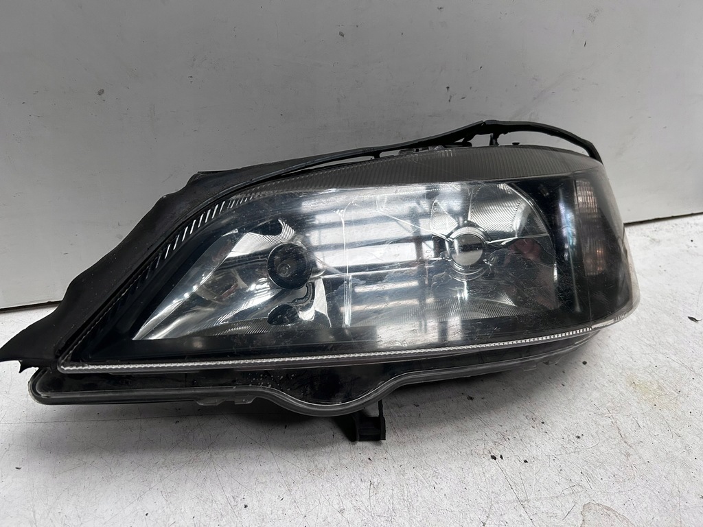 фото №1, Фара левый, чёрный opel astra g