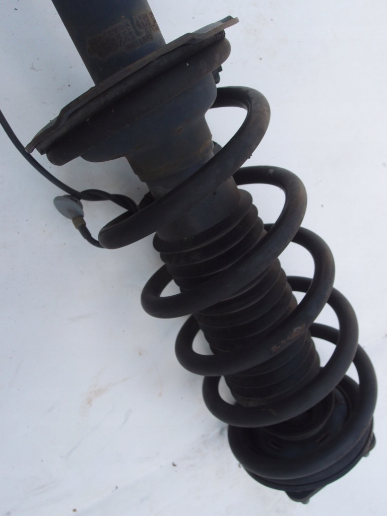 Mcperson амортизатор правая  перед mazda 3 cx-7 Недорого