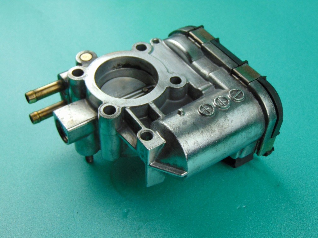 фото №10, Оригінальна!!!! дросельна заслінка corsa c 0280750044 opel 1,0 1,2