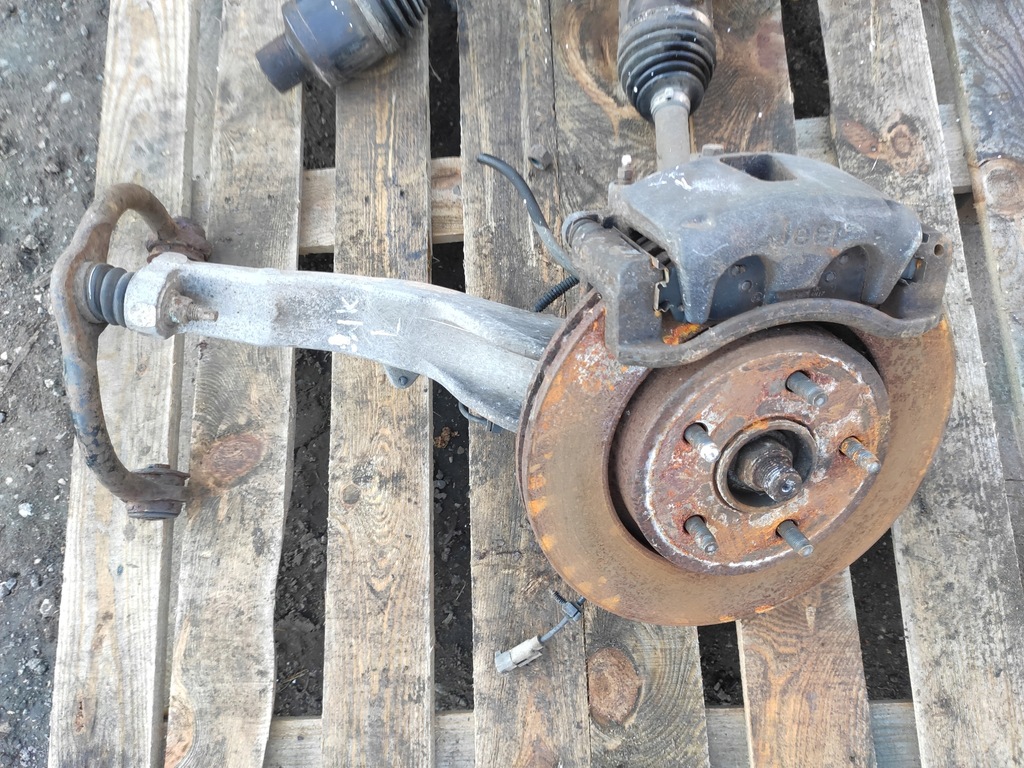 фото №9, Jeep grand cherokee wk 3.0crd commander xk поворотный кулак ступица приводной вал суппорт оригинальный номер