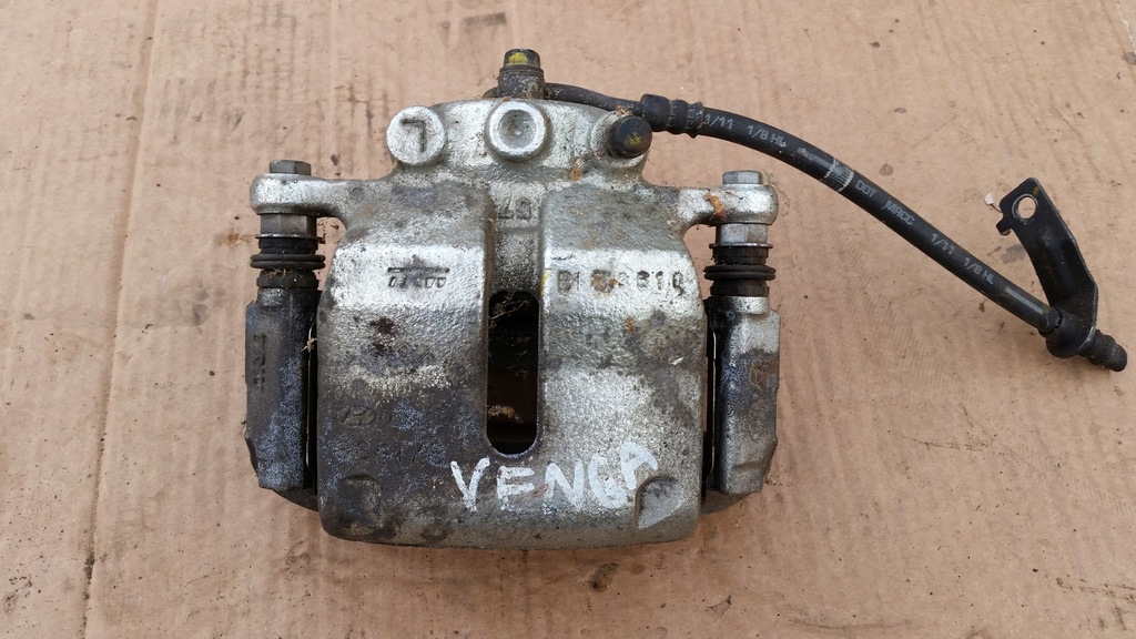 фото №1, Kia venga 09- суппорт тормозной передний левый