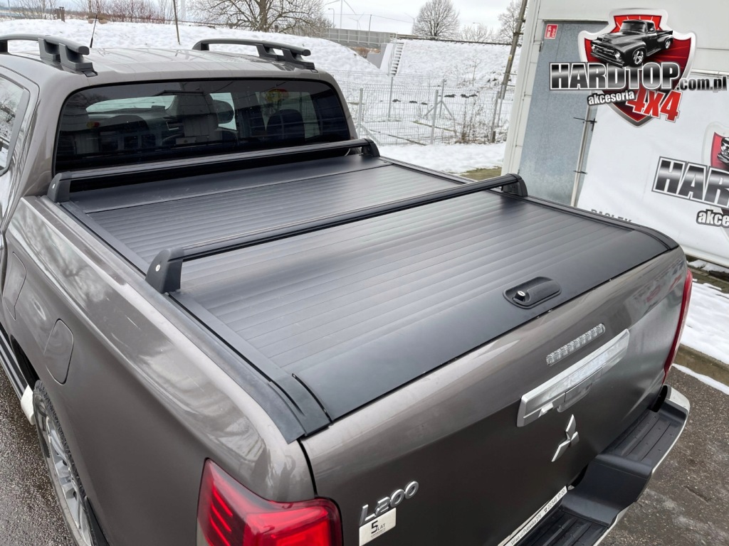 фото №1, Шторка mitsubishi l200 оригінальна рейлінги балка