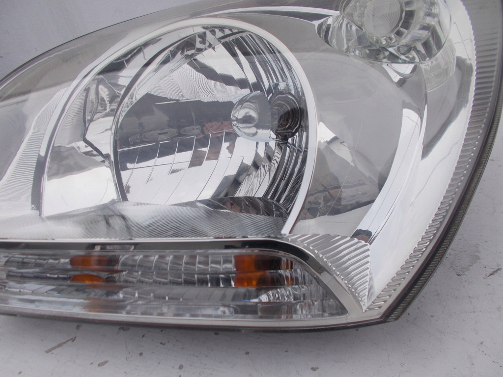 фото №4, Фара лампа kia sportage ii 2 europa левая